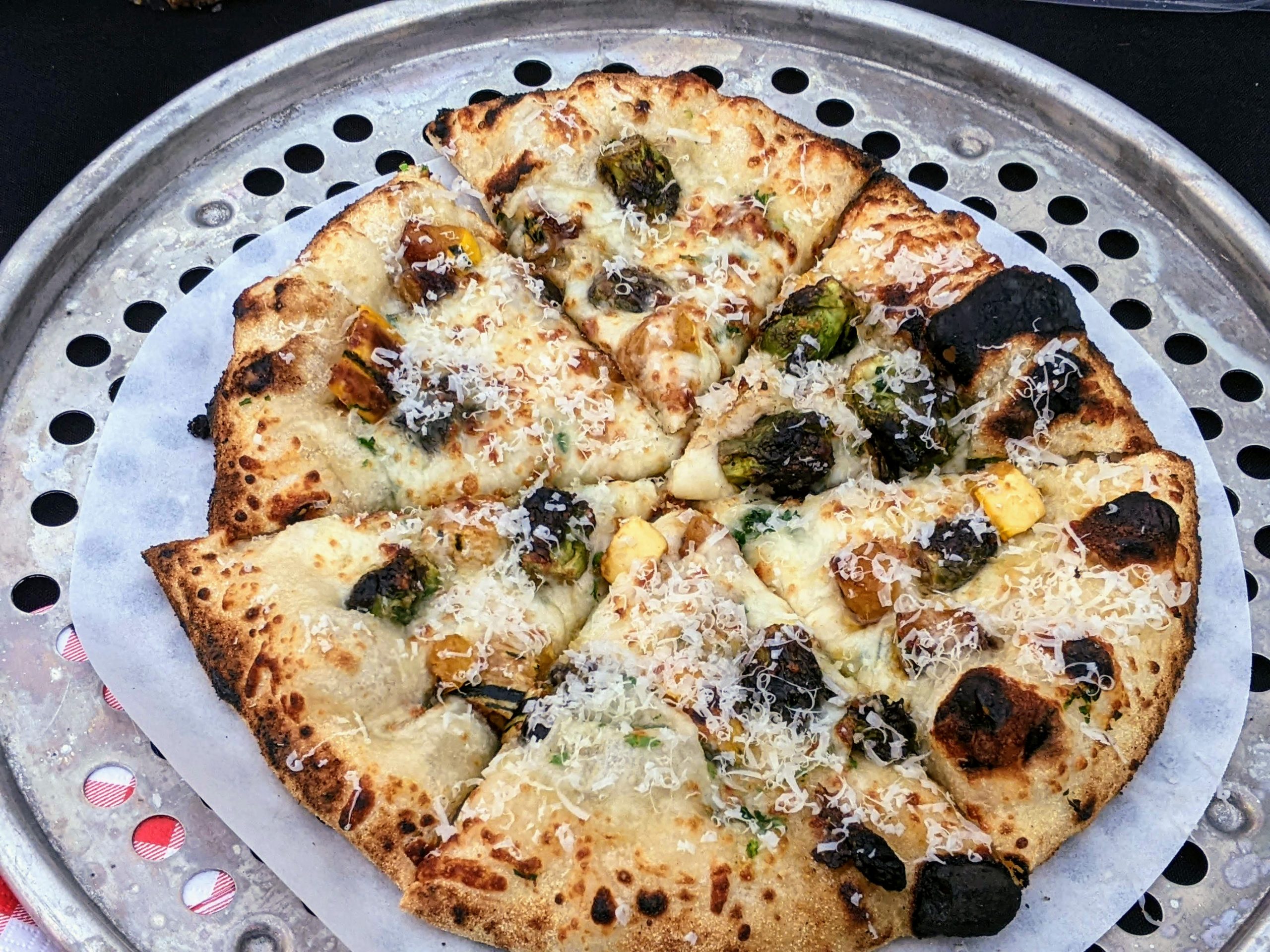 Cheese pizza by Crafted Food Services at the Plant Life Pizza Picnic outside of Des Moines