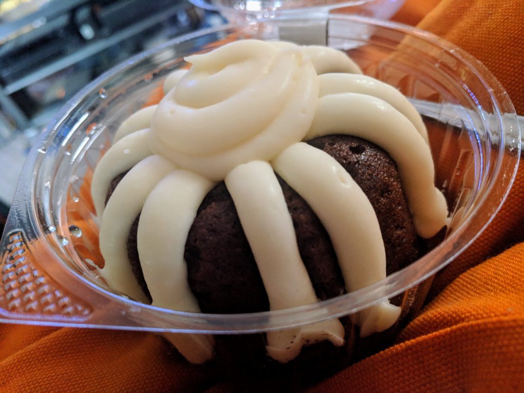 Out of the container: Chocolate chocolate chip nothing bundt cake with cream cheese frosting (not whipped cream)