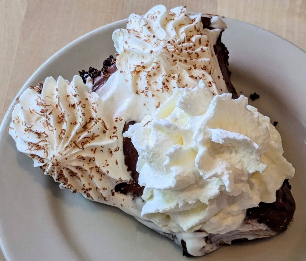 Whipped cream on French silk pie