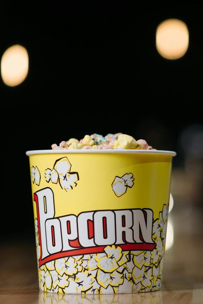 bucket of popcorn in close up photography