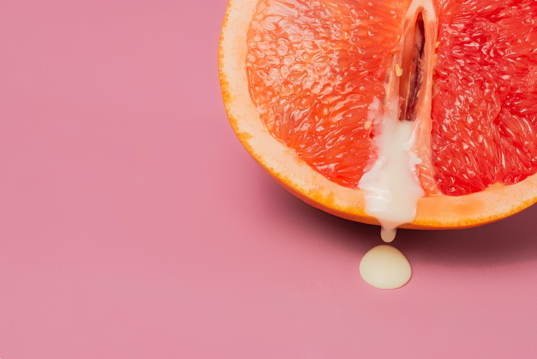 body art: grapefruit in shape of vagina with sperm cut